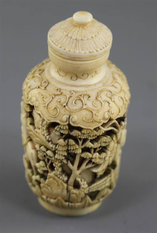 A Chinese ivory snuff bottle and stopper, 19th century, height 8.8cm